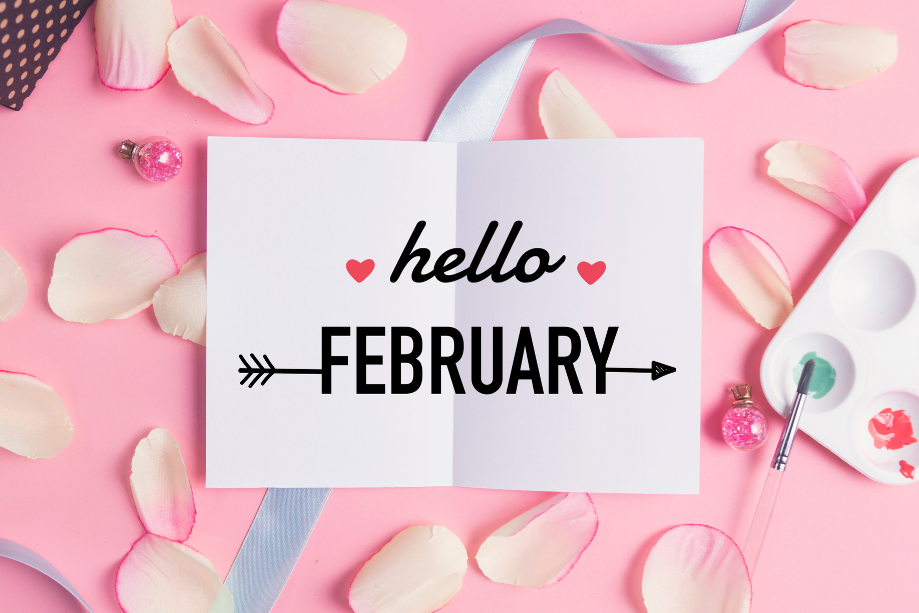 Hello february on pastel background.